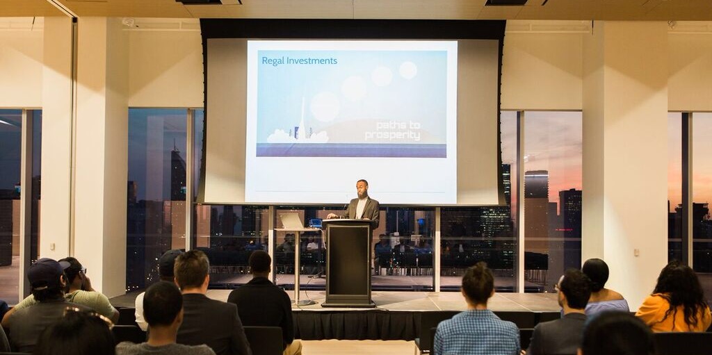 Roble speaking at event